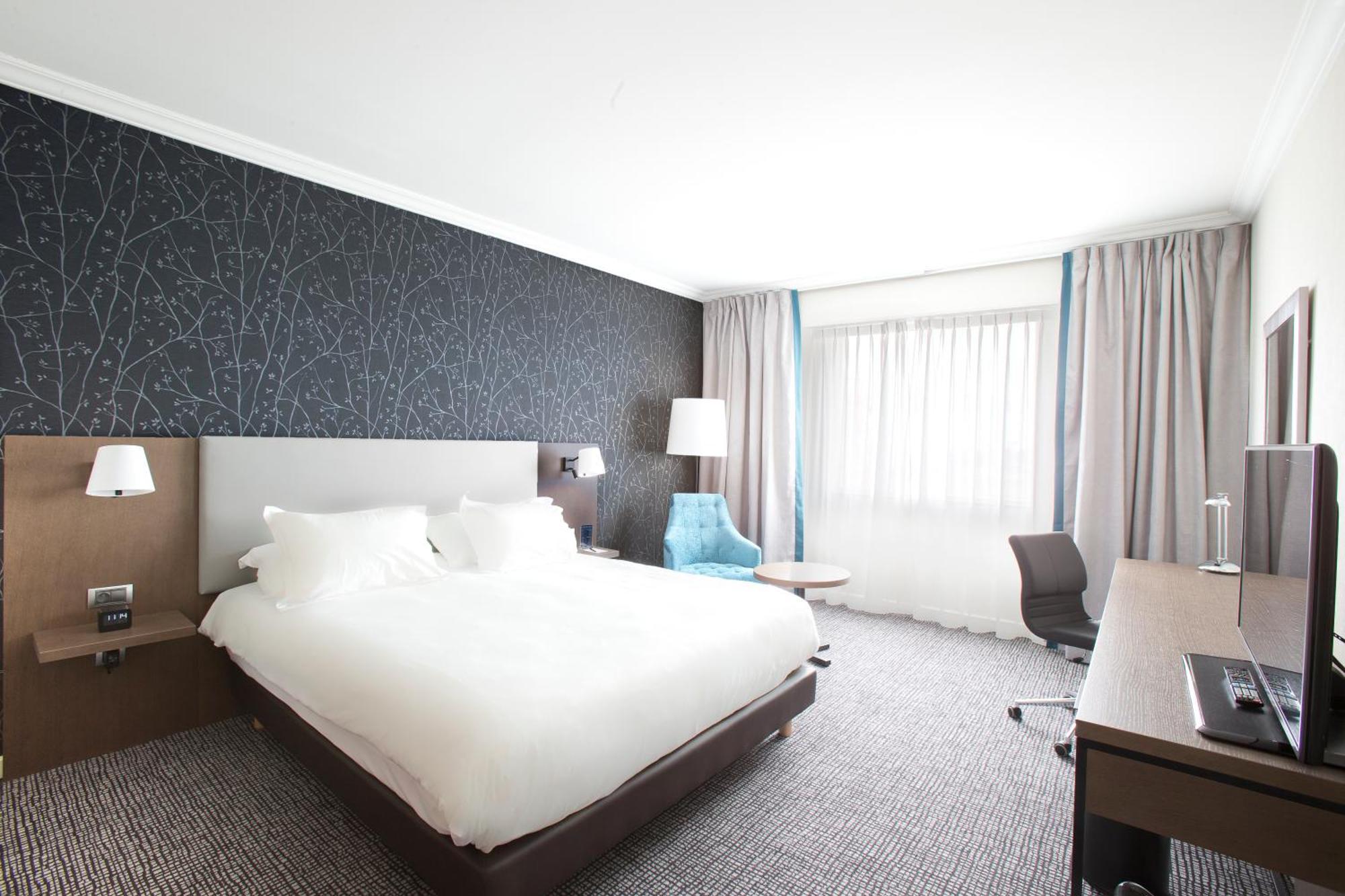 Hotel Hilton Paris Charles De Gaulle Airport Le Mesnil-Amelot Exterior foto